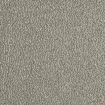 Gray leather texture, full-grain “pelle plus” sample with repeating pore pattern, muted cool tone, smooth matte finish.