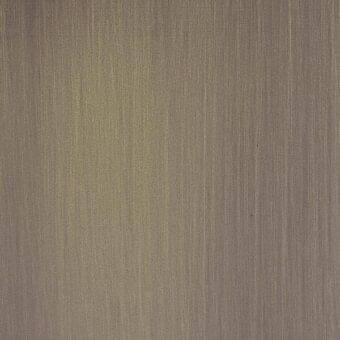Brushed brass surface with vertical grain, warm muted tone, and matte finish displaying a consistent linear texture and diffused lighting.