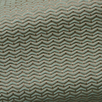 Green geometric fabric sample with undulating horizontal lines, a raised weave, and a subtle sheen; labeled “belmondo fabric bm”.