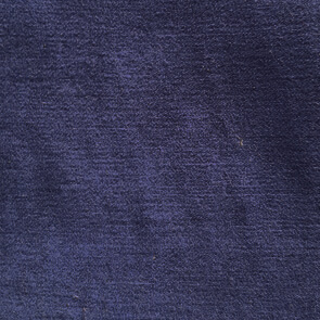 Indigo fabric texture with a dense, raised weave and uniform surface; sample labeled “bellavista > fabrics > cat a > 74 31”.