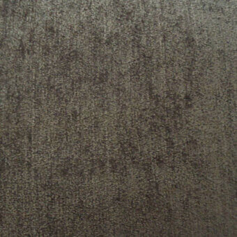 Woven fabric texture in warm gray with mottled brown and charcoal tones, exhibiting a dense, uniform pile and slightly brushed surface.