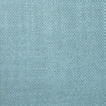 Woven fabric texture in pale blue-green, exhibiting a nubby surface and matte finish with a regular grid weave, labeled “bellavista fabrics cat extra lusso”.