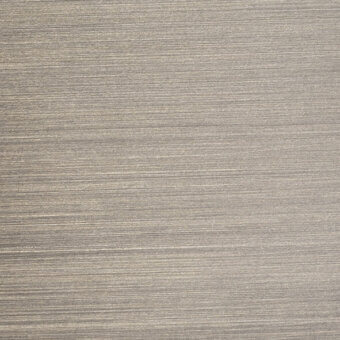 Antique bronze brushed metal texture with vertical linear striations, muted warm gray-brown tone, and a matte, non-reflective finish.