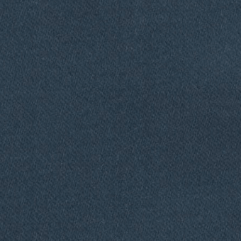 Teal fabric sample with a tight weave and matte finish, exhibiting a consistent granular texture suitable for upholstery or drapery applications.