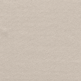Beige sateen fabric sample displays a finely woven, matte texture with subtle shading and a uniform density, labeled “bizzotto > cushions > fabrics b > b – sateen 7509”.