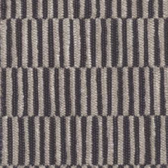 Woven fabric texture, beige and gray geometric stripes, tight linear weave with varying widths, neutral color palette, Bizzotto collection.