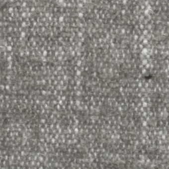 Gray woven textile with a speckled pattern, exhibiting a fuzzy, irregular surface and a muted, matte finish throughout.