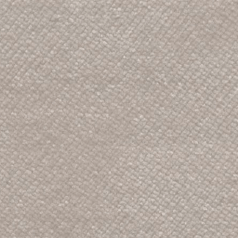 Velvet fabric texture features a light beige and gray diamond weave with a dense, raised pile and consistent, subtle pattern.