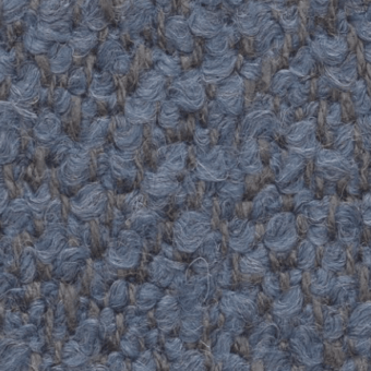 Woven fabric texture, muted blue-gray and beige, dense looped construction with irregular nubby surface and heathered effect.