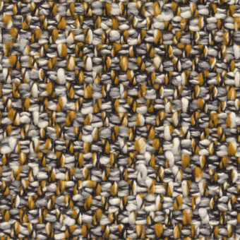 Woven fabric sample in mustard yellow, gray, and off-white with a dense geometric pebble pattern and nubby texture, labeled “bizzotto” cushions fabric.