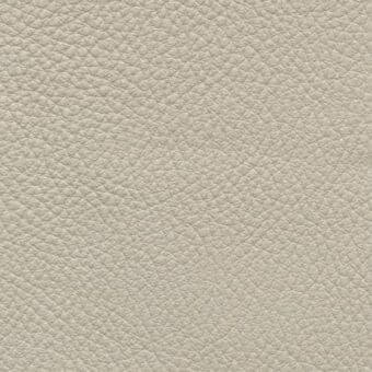 Light beige pebble grain leather texture with a dense, rounded indentation pattern and matte finish, displaying subtle tonal variations.