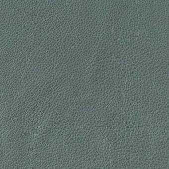 Gray-green leather texture sample displaying a fine grain pattern, matte finish, and embossed “bizzotto nara leathers vogue 6047” text.