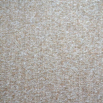 Beige and off-white textured fabric with a dense, nubby weave and matte finish, displaying a consistent granular pattern throughout the sample.