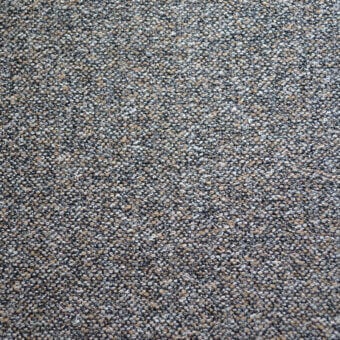 Fabric sample, gray-beige blend, granular texture with speckled surface and tight weave; “bolzan letti” label visible.