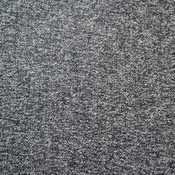 Agata fabric texture by Bolzan Letto, muted gray woven textile with speckled granular pattern and tight, uniform matte finish.