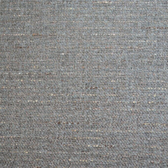 Gray woven fabric sample with heathered texture, displaying beige, brown, and cream flecks in a dense grid pattern and matte finish.
