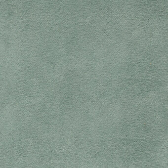 Novabuk 60 fabric sample, muted sage green, granular texture; soft, plush surface with uniform speckling and a matte finish.