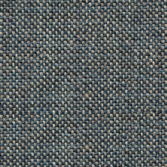 Woven fabric texture, muted blue and beige tones, dense irregular pattern with visible vertical and horizontal threads, matte finish.
