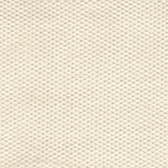 Cream velvet fabric texture displaying a dense, repeating geometric weave with rounded nodes and a plush, slightly raised surface.