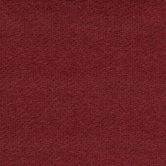 Burgundy red fabric texture, densely woven with a granular, matte finish; label reads “bolzan letti > fabric > fabric (plus) > st moritz > 073”.