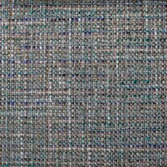 Melange fabric sample with dense irregular weave, featuring gray, teal, beige, and purple threads in a muted, heathered texture.