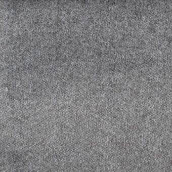 Dense gray woven fabric texture with a granular appearance, uniform matte surface, and heathered effect, presented in studio lighting.