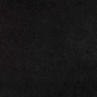 Dark gray textile sample displaying a dense, granular weave; likely velvet or plush fabric with uniform pile and subtle tonal variations.