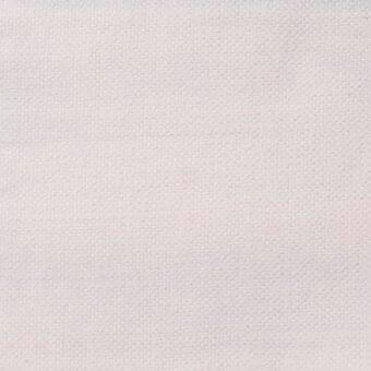 Beige fabric sample with dense weave, subtle dot texture, and translucent pink markings; studio shot displaying material characteristics.