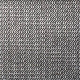Diagonal woven fabric sample with dark brown and light gray yarns, displaying a dense texture and subtle sheen in a repetitive pattern.