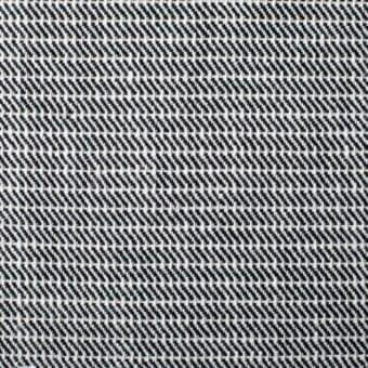 Diagonal weave textile, black and off-white, geometric pattern with textured surface; Bonaldo fabrics, model SA80.