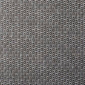 Woven fabric sample, dark brown and off-white, displays a repeating rectangular grid pattern; “Rombo” design from Bonaldo’s “SA63” collection.
