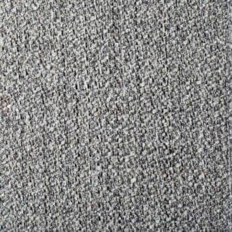Gray woven fabric sample with speckled texture and diagonal rib pattern, displaying compact, irregular weave and subtle beige thread variations.
