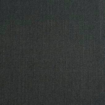 Dark gray woven fabric texture with heathered flecks of light gray and green, dense matte finish, nubby fiber blend.