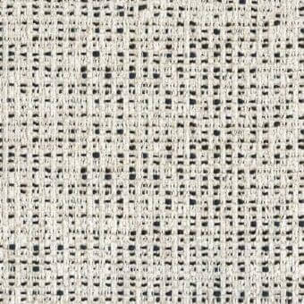 Pantheon fabric sample, creamy off-white and navy, dense woven texture with irregular speckled pattern, studio shot, MD65 model.