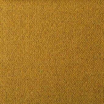Mustard yellow fabric sample with dense, irregular weave and matte finish; Bonaldo Rico collection, ma12 designation visible on label.