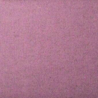 Mauve fabric texture with a dense, granular weave and matte finish, displaying a speckled surface and subtle fiber variations against a neutral backdrop.
