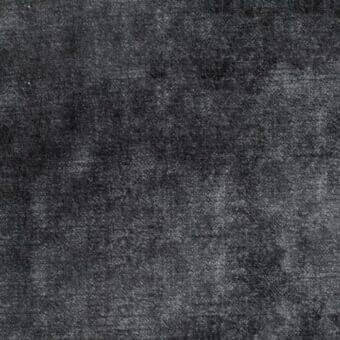 Dark gray fabric sample displaying a dense, granular texture with mottled tonal variations and an implied association with the Vegas MB10 collection.
