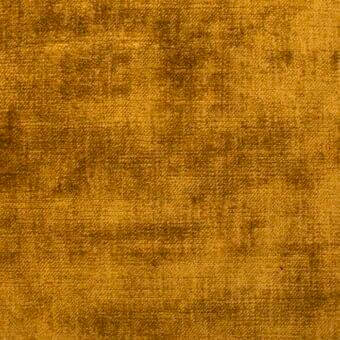 Vegas fabric sample, golden-yellow velvet texture, mottled weave with tonal variations and granular surface, Bonaldo MB17.
