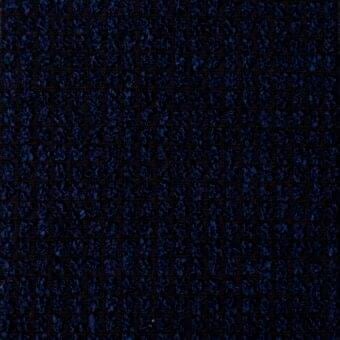 Navy blue bouclé fabric texture with a dense, looped pile and mottled tonal variations, exhibiting a nubby, irregular surface.