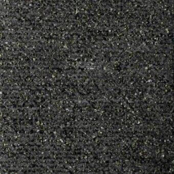 Bonaldo fabric texture, dark charcoal gray, diamond frise pattern with yellow-green flecks, dense looped pile weave, matte finish.