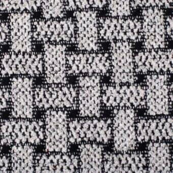 Woven fabric texture, black and off-white geometric pattern, grid structure with circular elements, from Bonaldo sp09 collection.