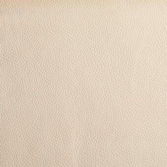 Bonaldo Capri leather texture, light beige, with a fine, irregular pebbled grain and matte finish, studio lighting.