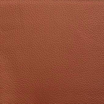 Bonaldo leather sample "l49" Capri range, reddish-brown, matte finish with granular texture and repeating dimpled pore pattern.