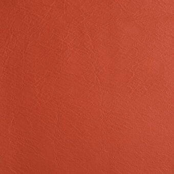 Reddish-brown leather texture with embossed grain pattern against white, displaying a matte finish and warm terracotta color with subtle tonal variations.
