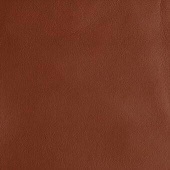 Brown full-grain leather texture with a fine, pebbled surface and matte finish, displaying warm reddish-brown tonal variations.
