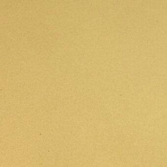Matt brass texture with granular finish, displaying a muted warm yellow-gold tone and even diffused lighting across the surface.