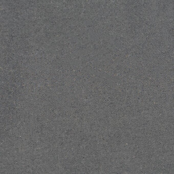 Dark gray fabric texture displays a granular weave with tonal variations, featuring a subtle swirl mark and product code “teno013 – granite”.