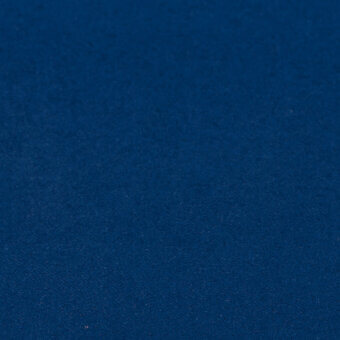Polar blue fabric texture with a dense granular weave, exhibiting subtle tonal variation and a brushed finish under even lighting.