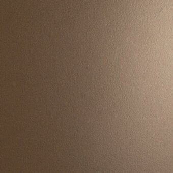Dark brass lacquered metal surface with granular matte texture, displaying a uniform warm brown tone and subtle sheen throughout the composition.