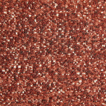 Reddish-brown tweed fabric texture with cream threads, dense woven construction, granular surface, labeled “geranio 2130” at the bottom.